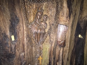 Old carving inside the trunk of a huge oak tree along my route today